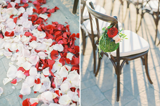 Wedding decor featuring rose petals and decorated chairs