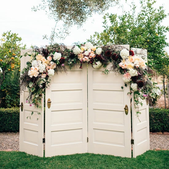 vintage door and floral garland backdrop