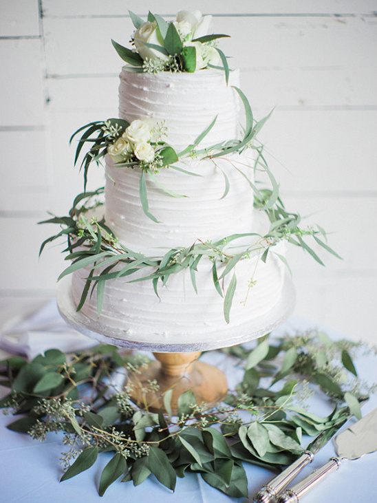 ecalyptus topped wedding cake