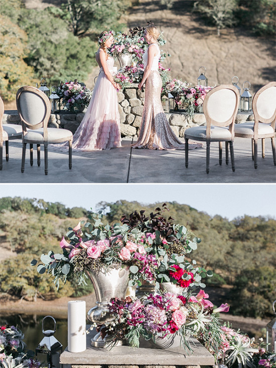 Two women at outdoor wedding with floral arrangements