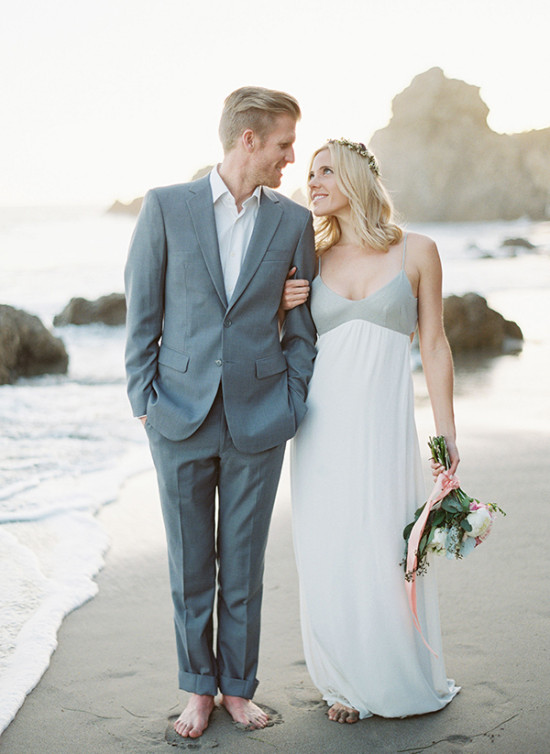 grey and white bride and groom beach outfits