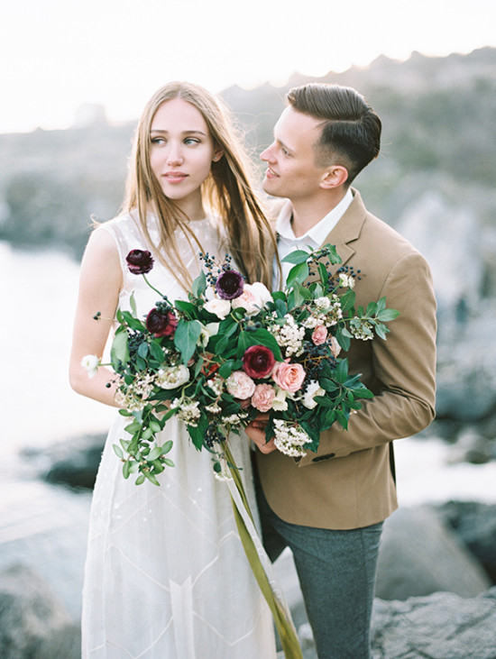 Romantic couple with floral bouquet outdoor wedding