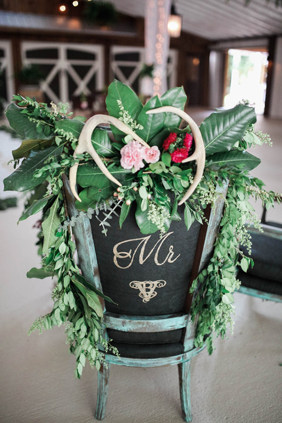 Mr chair decor with antlers and greenery for wedding day
