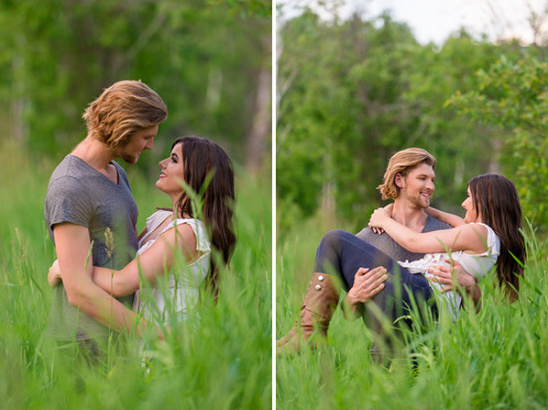 Romantic couple in embrace in tall green grass field