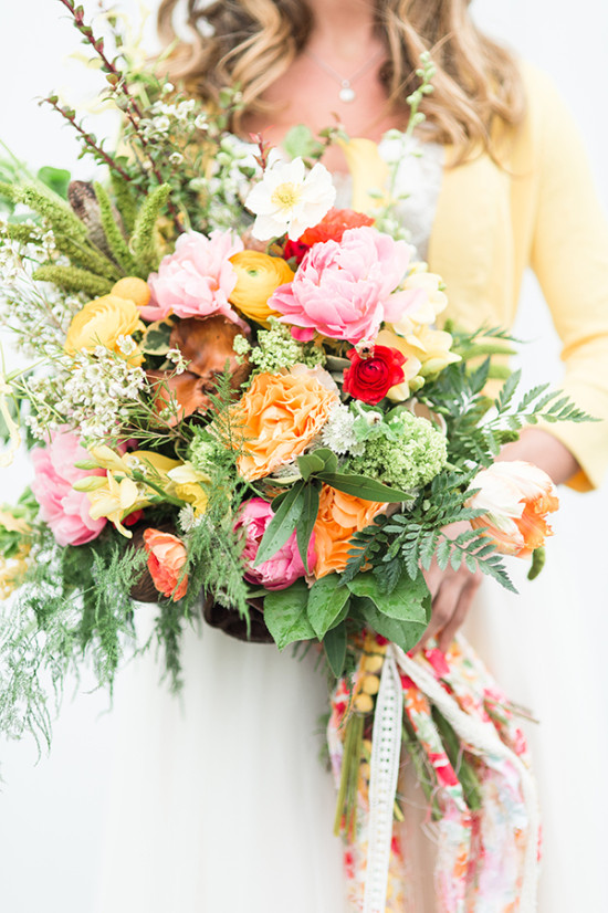 Vibrant spring wedding bouquet with colorful blooms