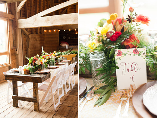 Rustic barn wedding reception table setting with floral centerpiece