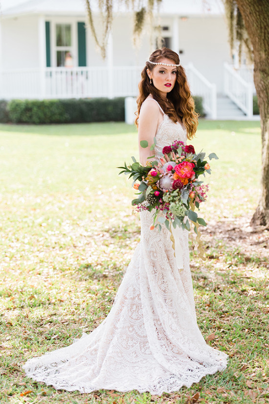 Lace wedding dress and bouquet