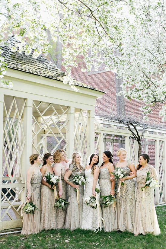 bridesmaids in assorted champagne and gold dresses