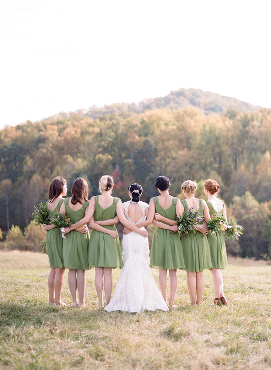 Bridesmaids in sage green dresses