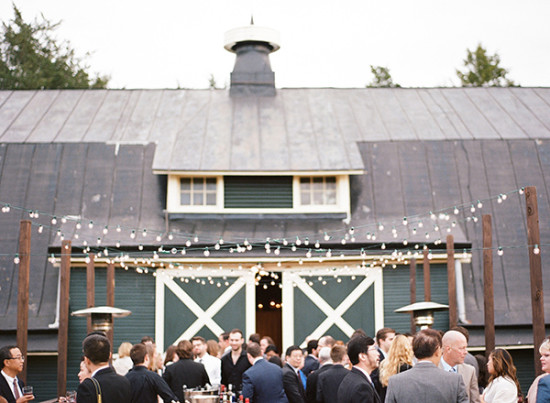 Barn wedding reception with string lights