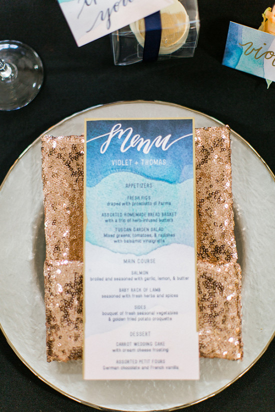gold and blue place setting with watercolor menu