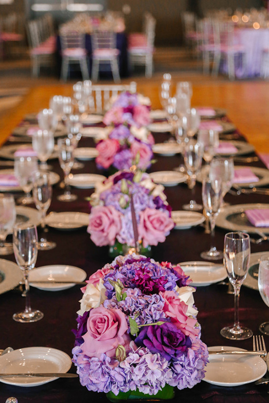 Elegant wedding table with pink and purple floral decor