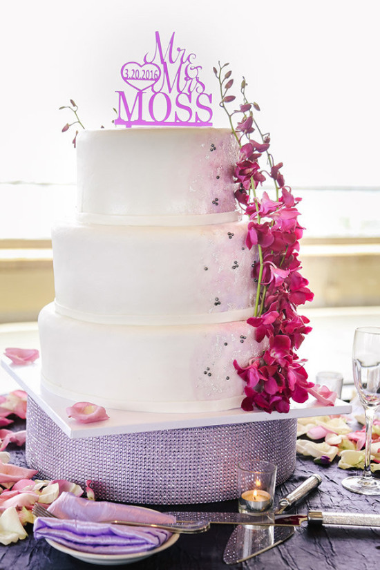 Elegant three tier wedding cake with floral decorations