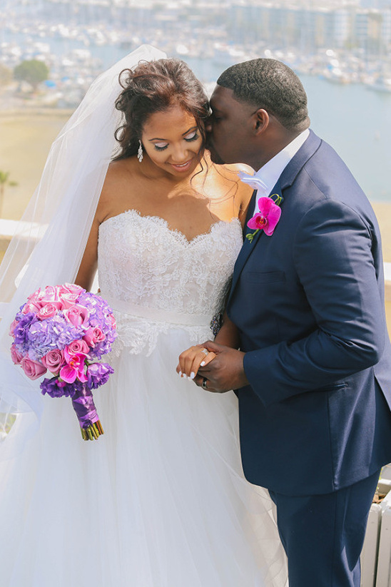 Bride and groom at waterfront wedding ceremony