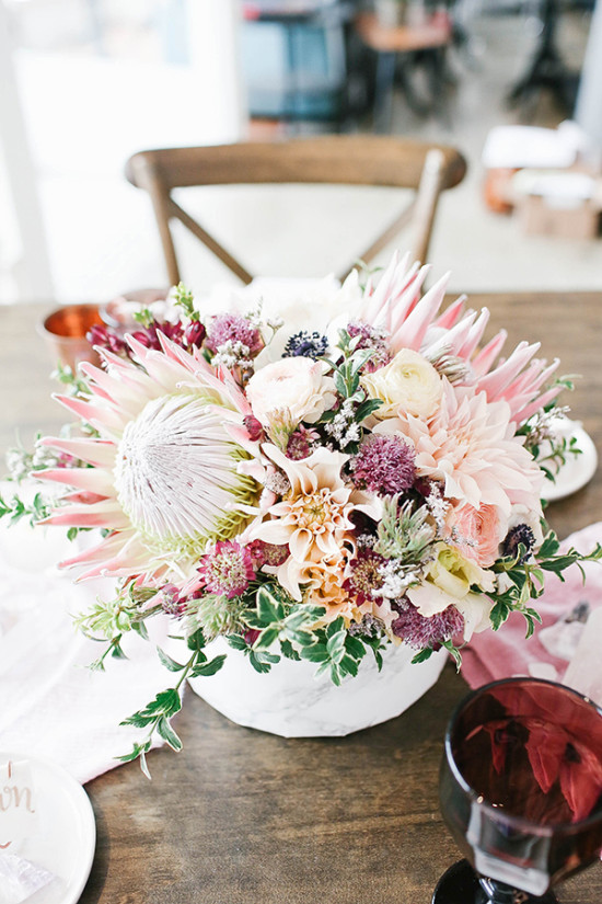 Elegant flower arrangement on wooden table centerpiece