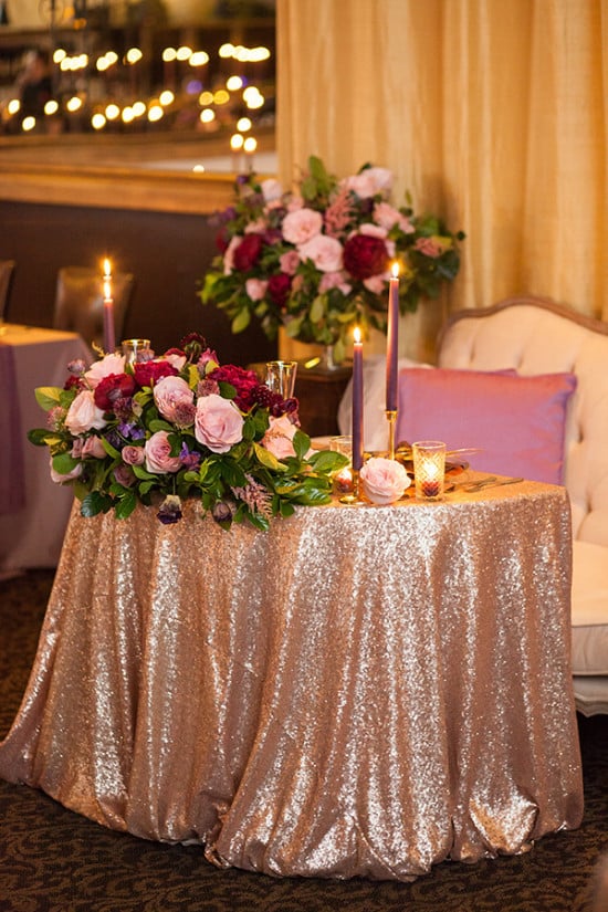 Sweetheart table in gold and purple