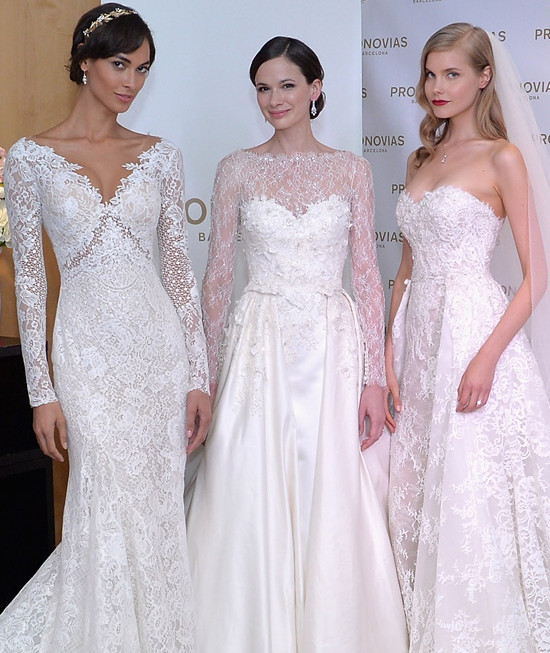 Three gorgeous lace wedding dresses on display