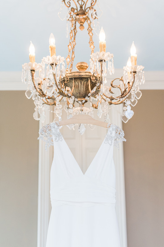 glam chandeliere with glamorous Amy Kuschel wedding gown