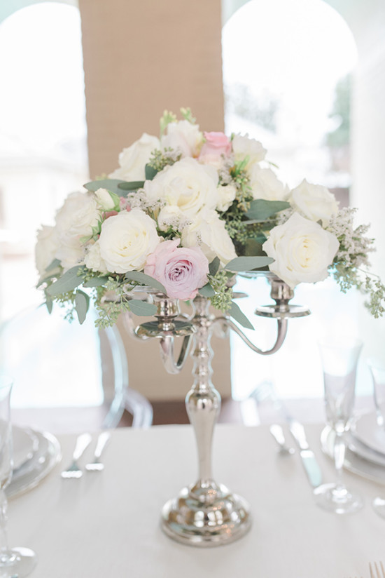 silver candelabra floral centerpiece in white and pink