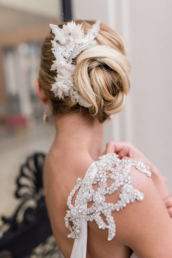 Elegant bride with floral hairpiece and jeweled dress