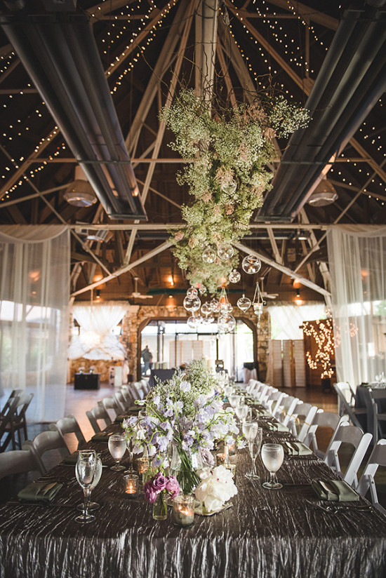 Elegant wedding reception with floral decor and lighting
