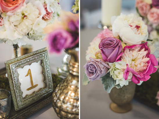 Wedding table decor with floral centerpieces and number one