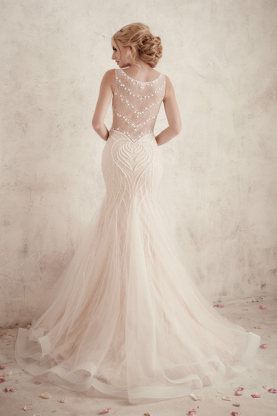 Elegant bride in a stunning wedding dress with intricate details
