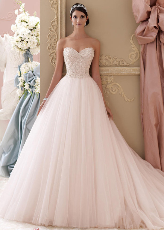 Bride wears an elegant strapless ballgown wedding dress