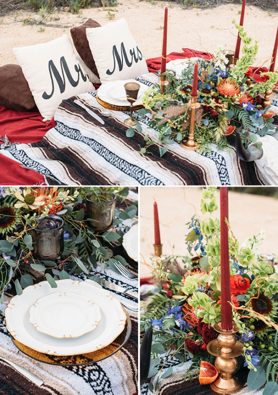 Lesbian wedding picnic table with flowers and candles outdoors