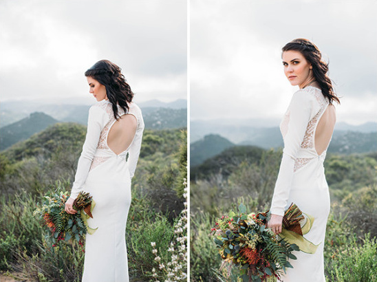 Bride in white wedding dress with bouquet in mountains