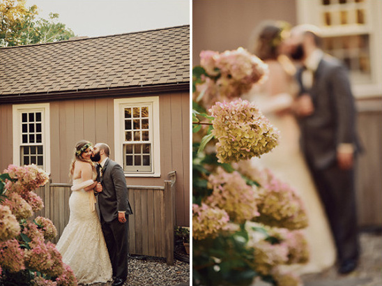 Bride and groom share a kiss on their wedding day