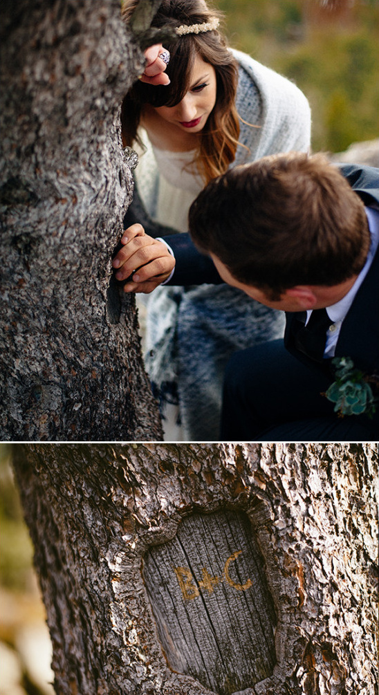 Bride and groom carving initials on tree bark wedding