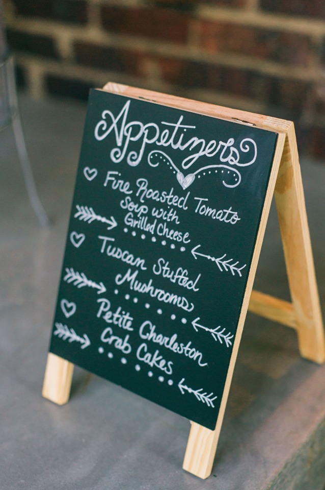 chalkboard sandwich board style wedding menu