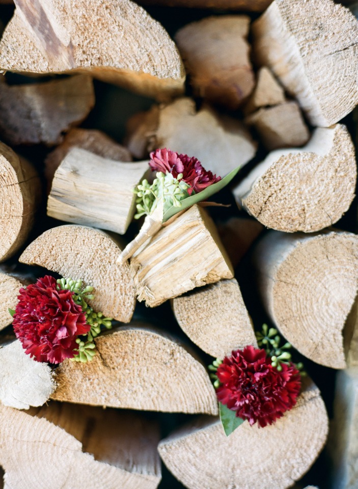 Floral accents on stacked firewood logs decor closeup