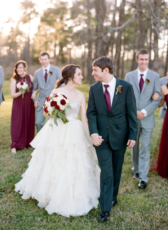 Bride and groom with attendants at outdoor wedding
