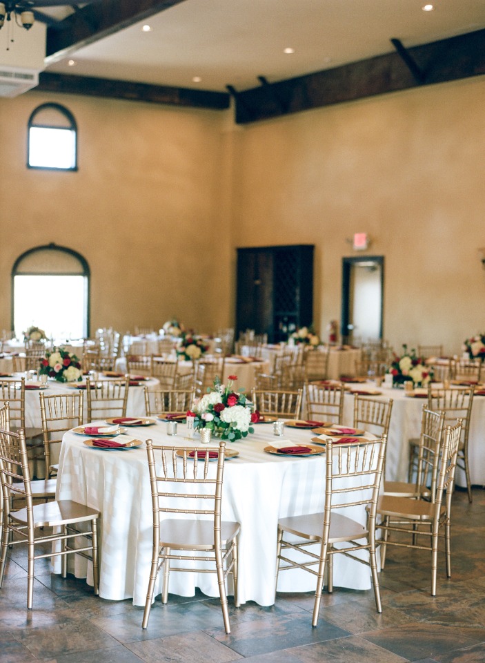 Gold and maroon reception decor
