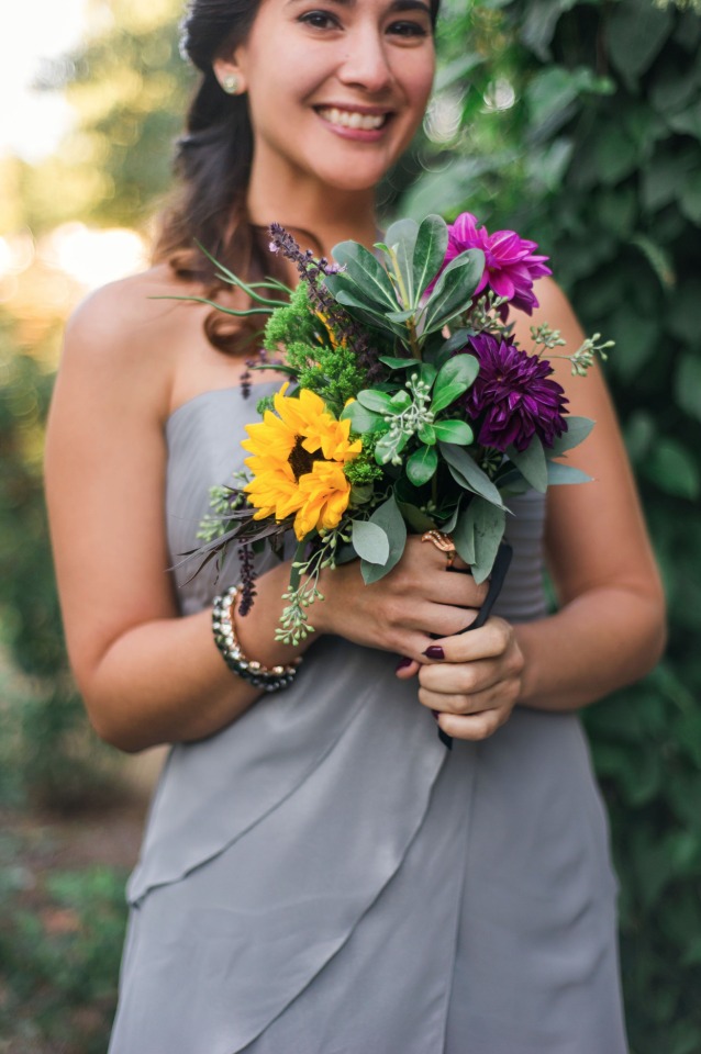 grey bridesmaid dress with yellow pink and purple bouquet