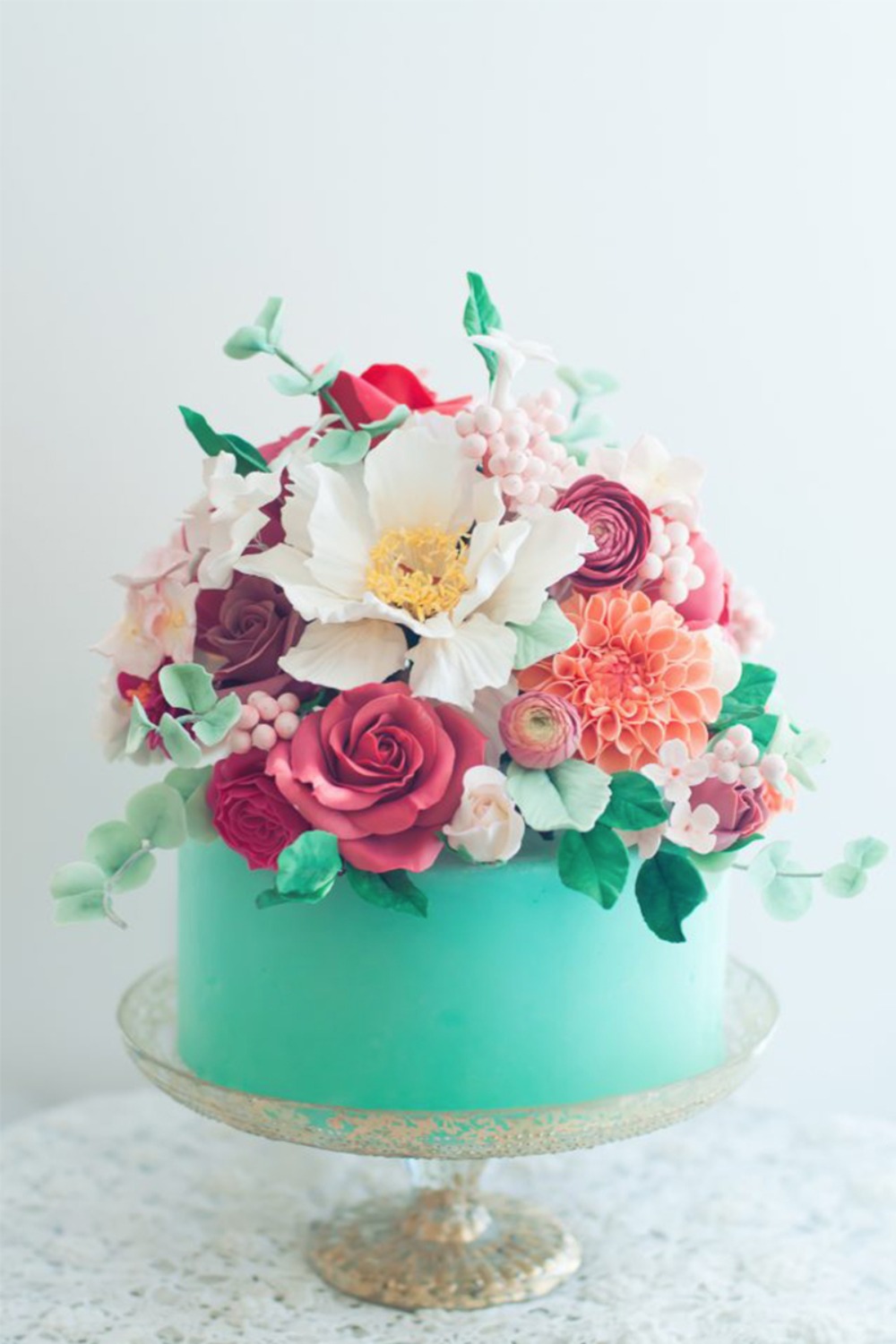 2016-05-05_0006_0018_Aqua-Floral-Cake-650x960