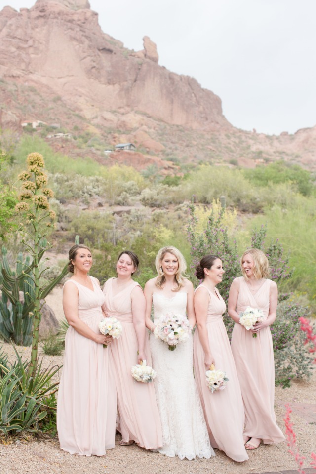 blush floor length bridesmaid dresses with white bouquets