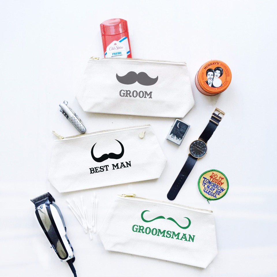 Groomsmen gift bags with mustache designs and wedding items
