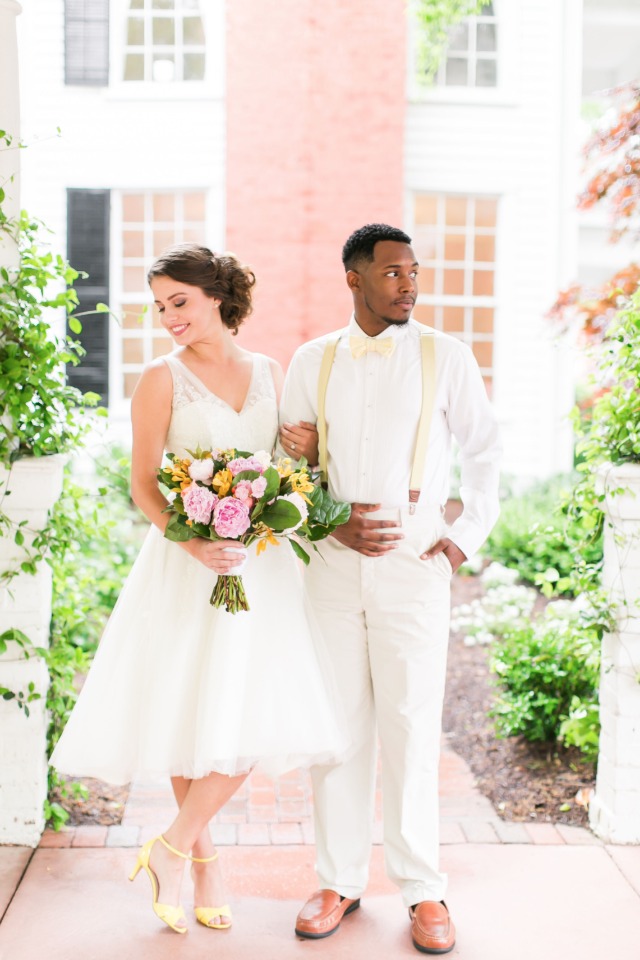 wedding couple in white and lemon yellow