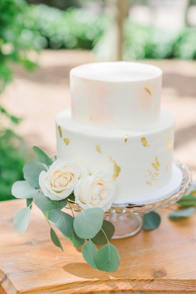 soft peach and blush watercolor and gold leaf wedding cake