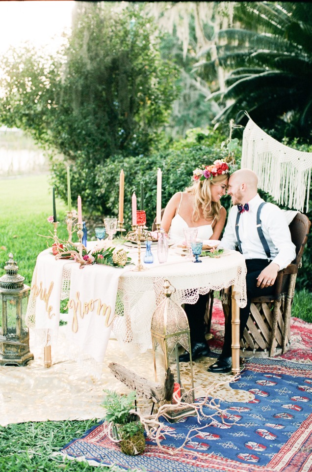 funky boho chic bride and groom sweetheart table