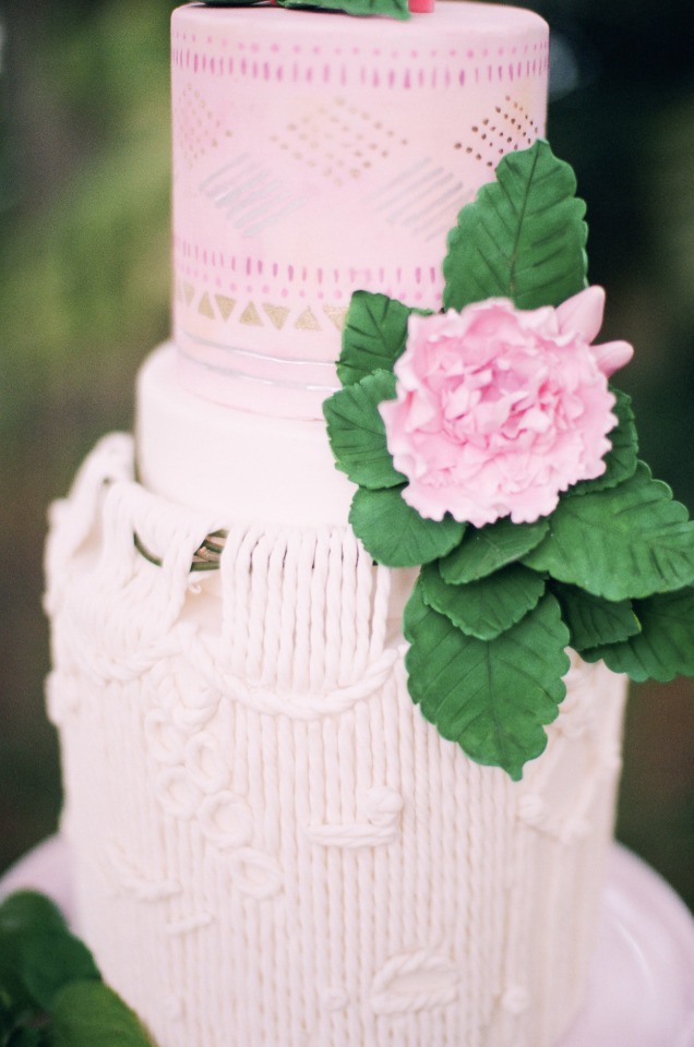 macrame wedding cake with a pink ombre
