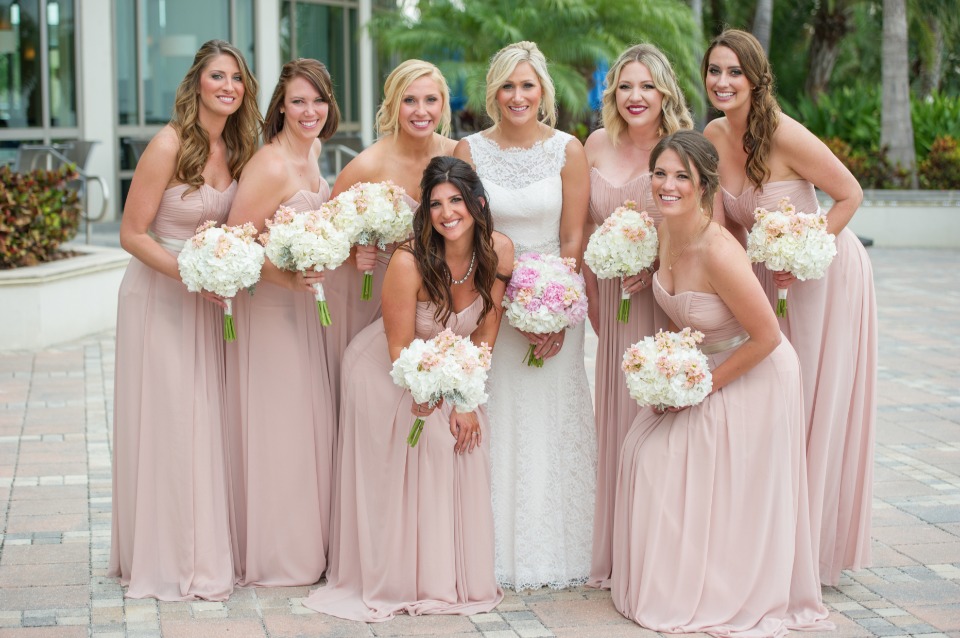 bridesmaids in floor length pink dresses