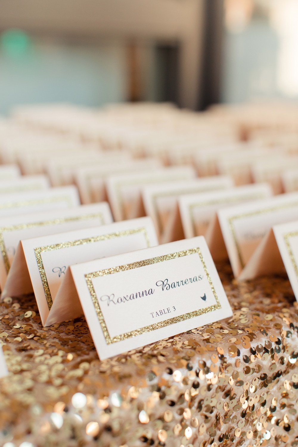 pink and gold wedding escort cards