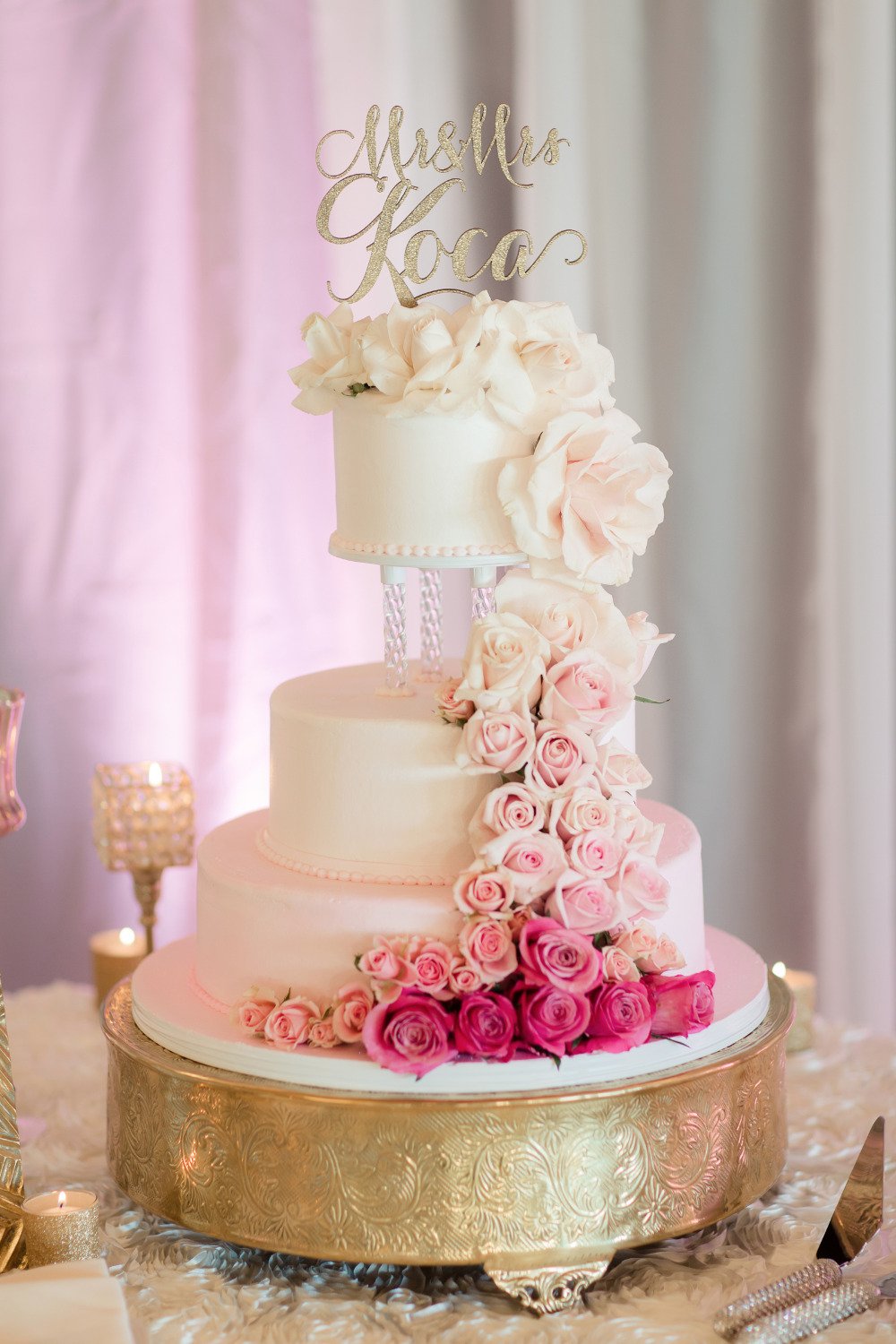 wedding cake with ombre cascading roses