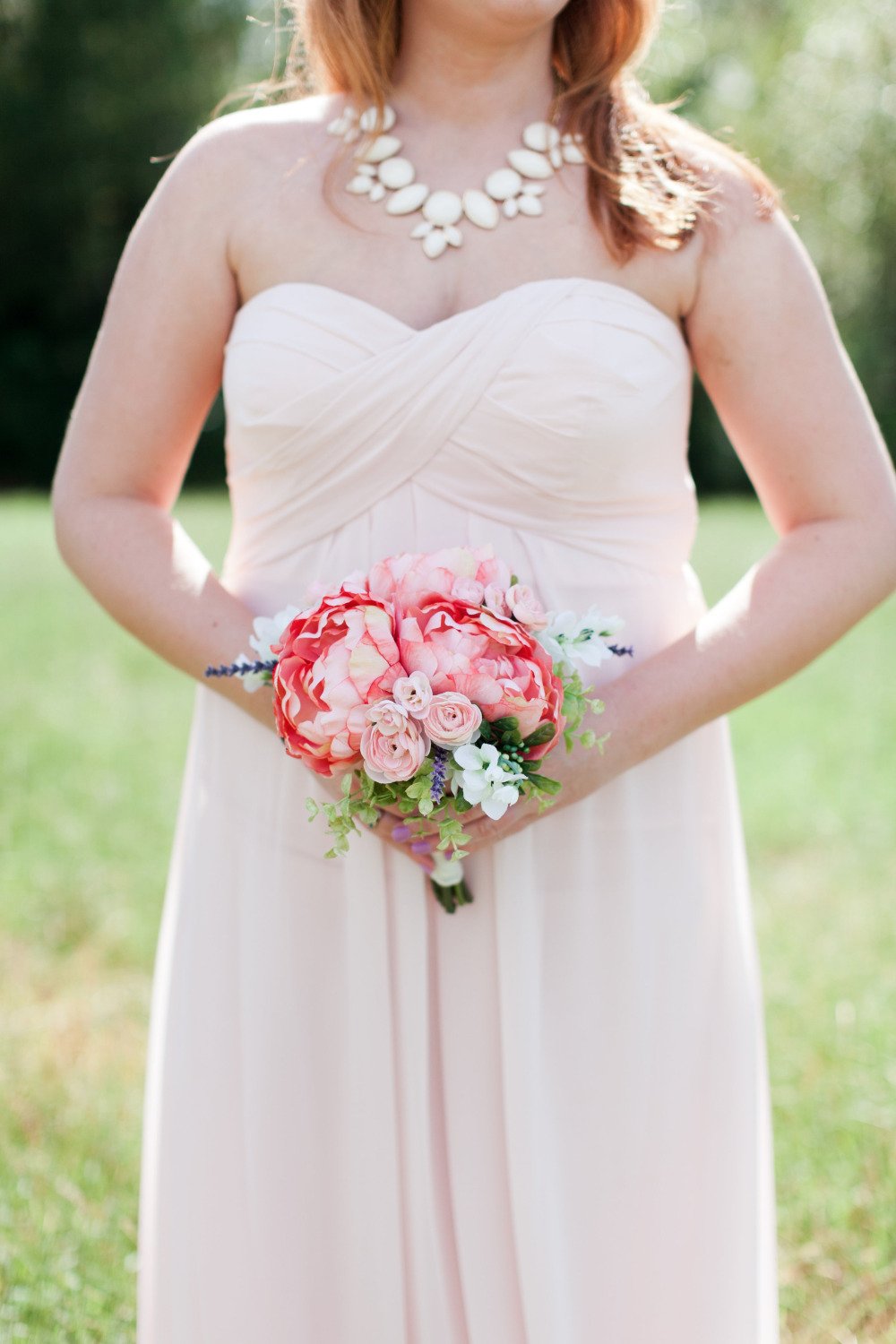 pink bridesmaid dresses and bouquets