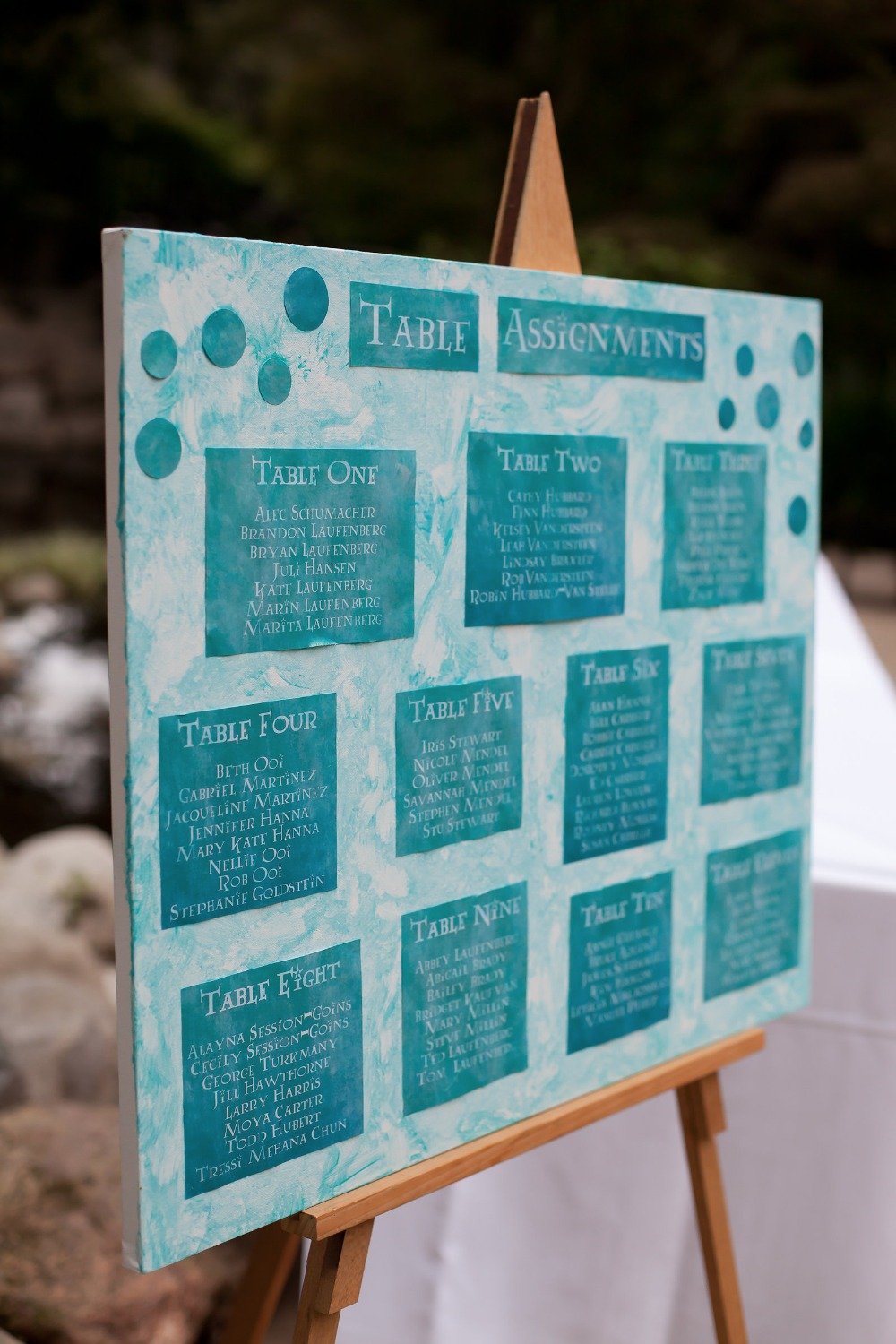 teal wedding seating assignment display