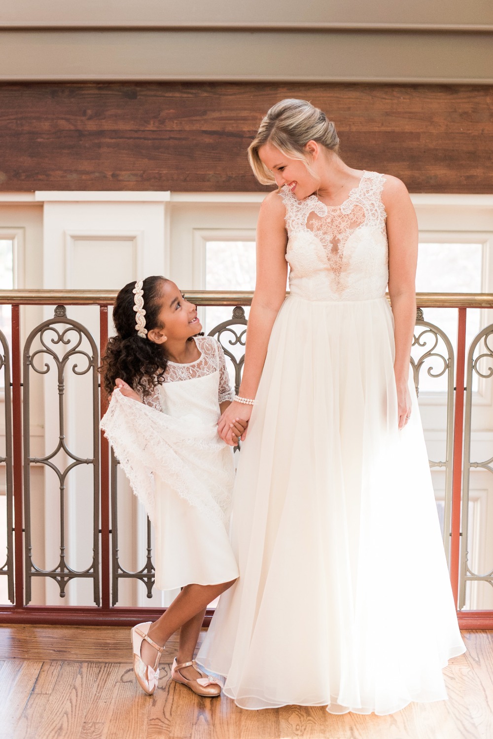 adorable bride and her flower girl